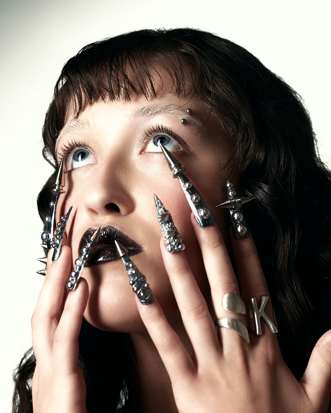 Nailed — Cover
